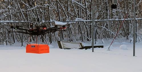 Drone flying over the snow.