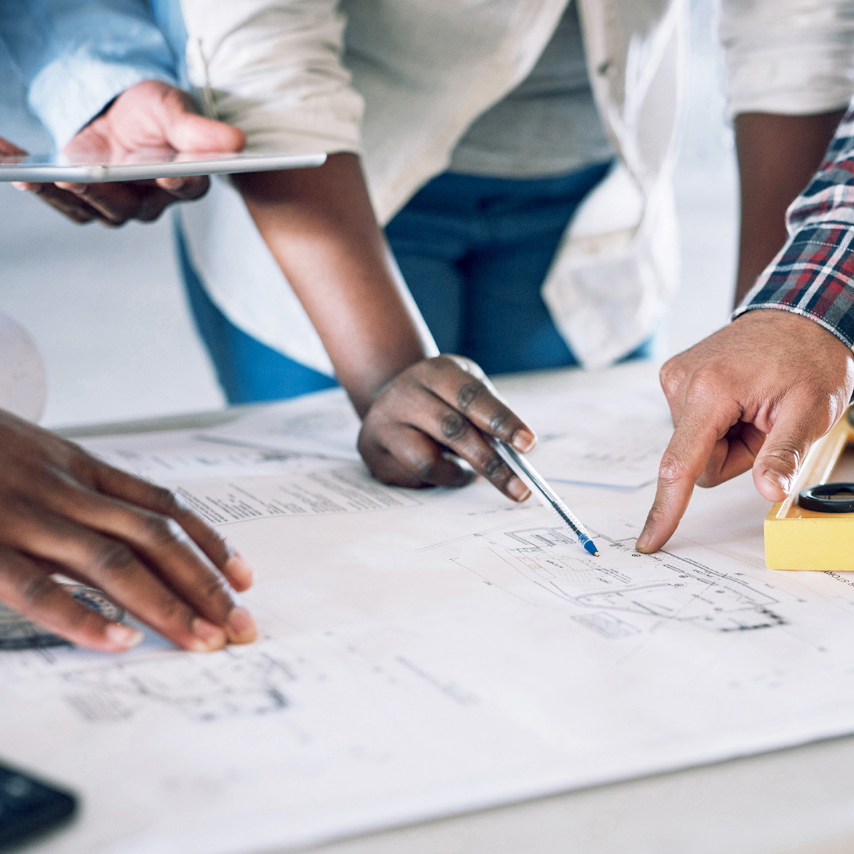 "Students engage in hands-on learning with technology blueprints."