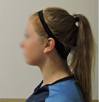 Student profile alongside advanced tech device.