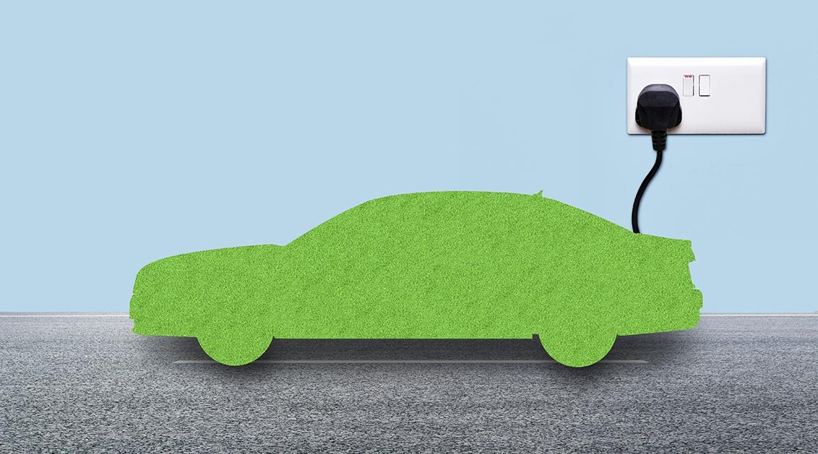 Eco-friendly car concept with green energy plug-in.