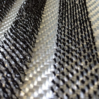 through-thickness reinforced (TTR) textiles