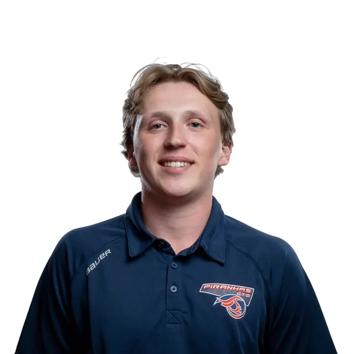 Étudiant souriant en maillot de sport, symbolisant l'esprit d'équipe et le dynamisme universitaire.