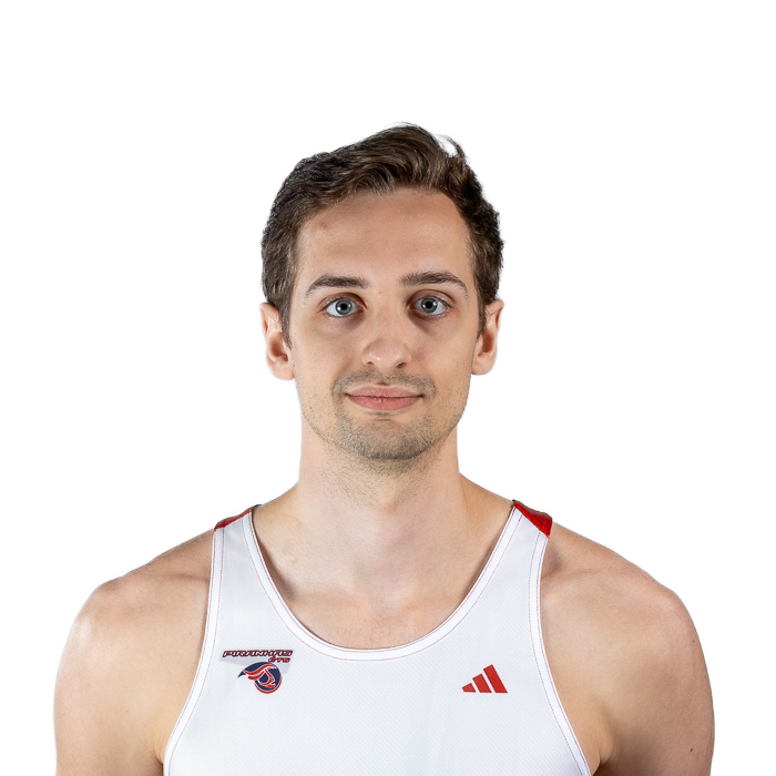 Étudiant athlète, souriant, vêtu d'un débardeur sportif, affichant confiance et détermination. Ambiance motivante et dynamique.