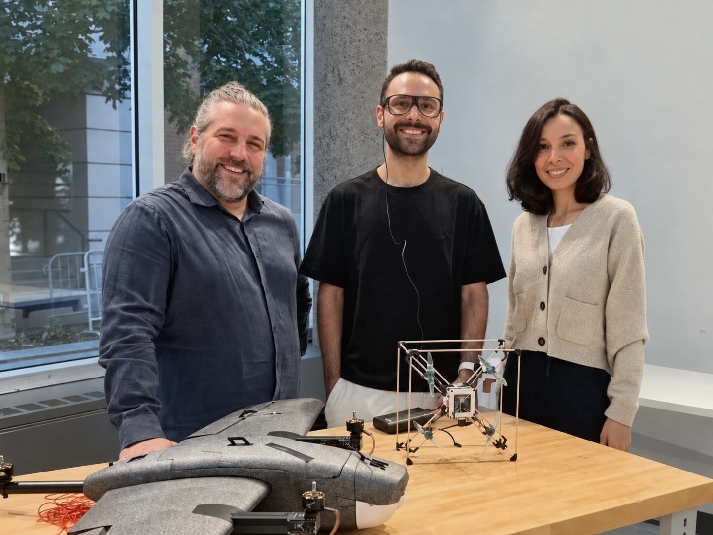 Students and faculty showcase innovative drone technology in a collaborative university project.