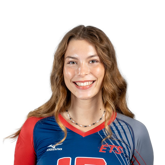 Athlète souriante en tenue de volley-ball, représentant fièrement son équipe avec passion et détermination.