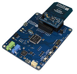 A SparkFun microcontroller board with integrated circuits for tech education.