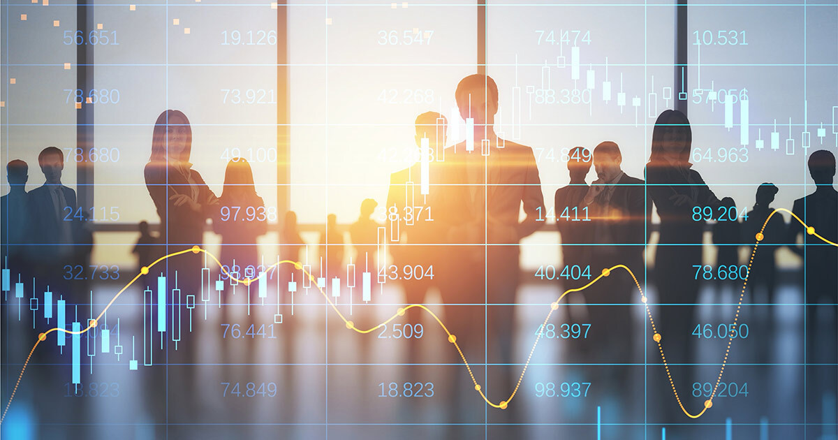 Professionals analyzing data trends against a backdrop of city skyline, symbolizing innovation and technology in business.