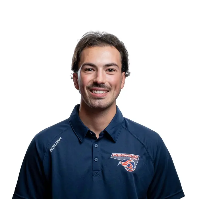 Étudiant souriant en tenue de sport avec logo de l'ÉTS.