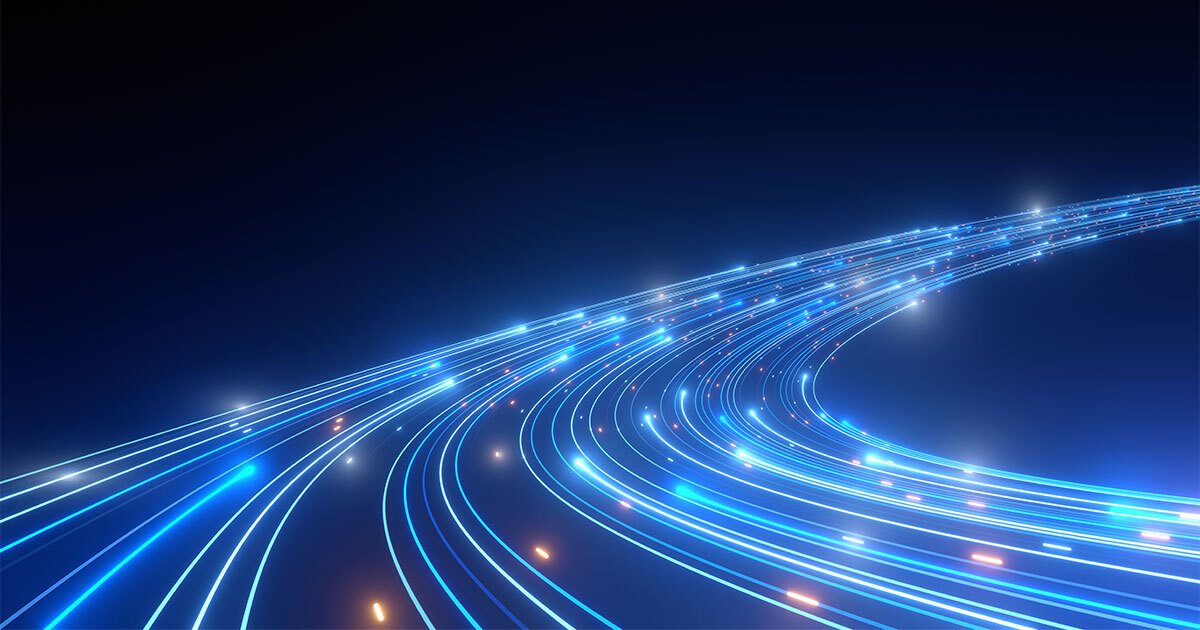 Abstract representation of luminous technology pathways, showcasing dynamic light trails against a dark background, symbolizing innovation and progress.