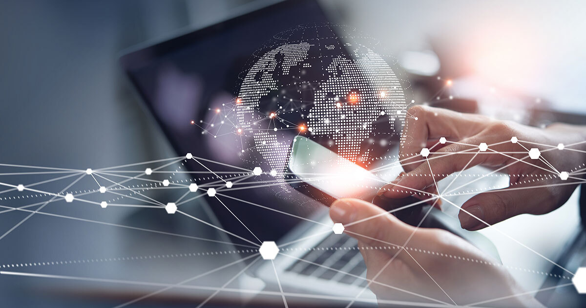 Exploring global connectivity through technology, merging digital interactions and data in a modern workspace.
