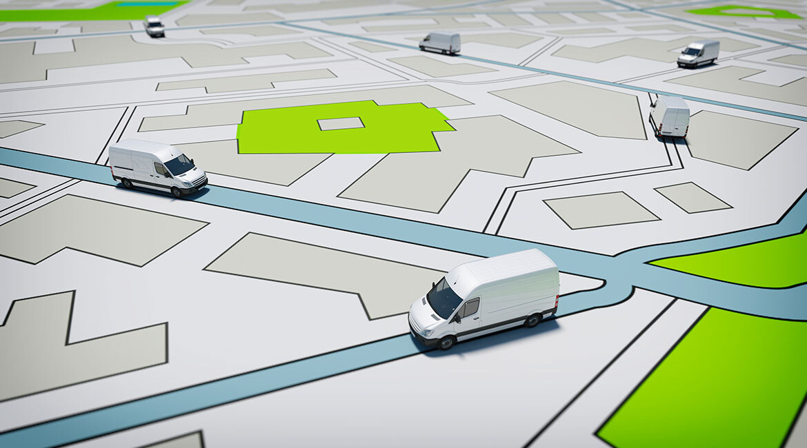 Véhicules autonomes naviguant dans une maquette de ville intelligente.
